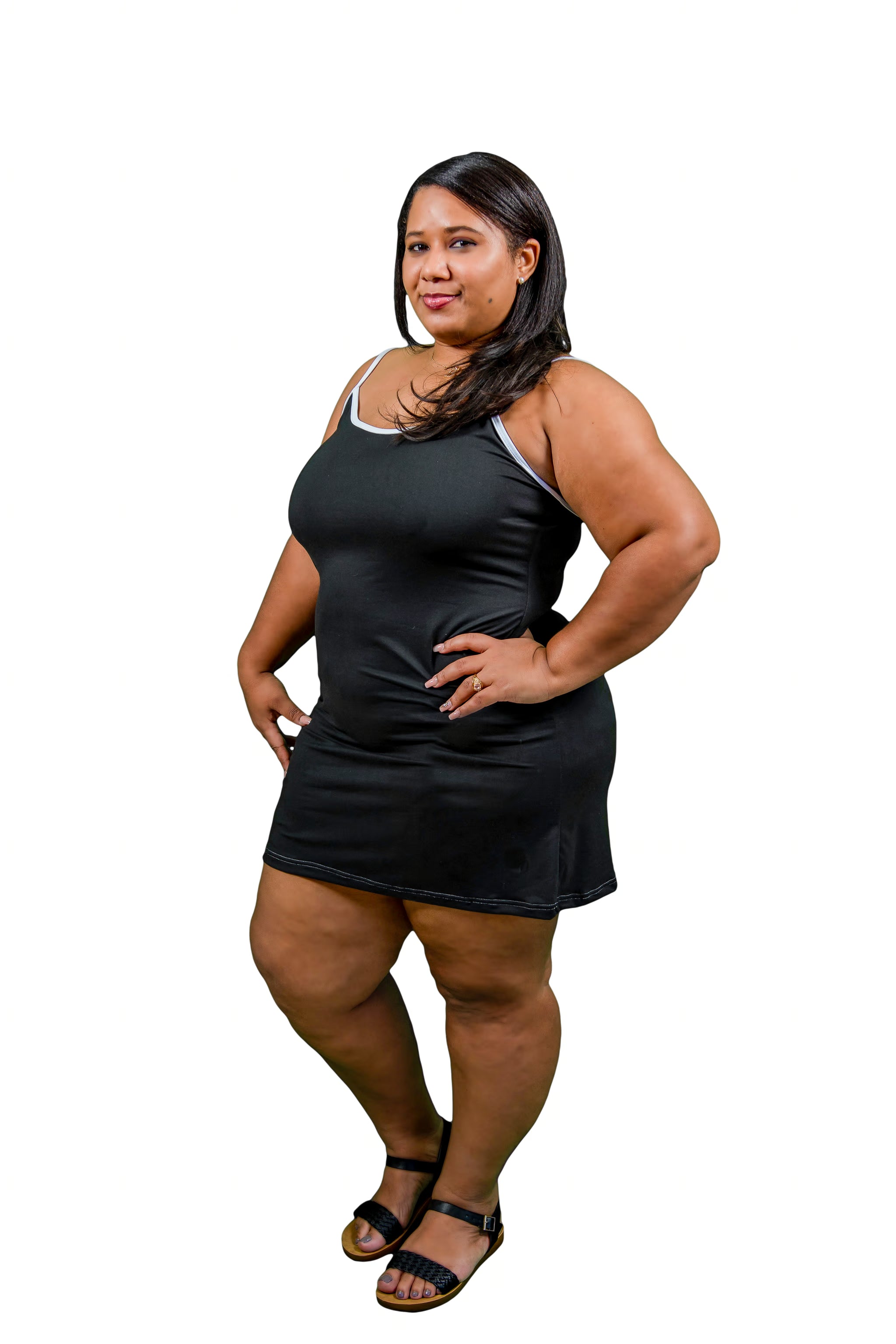 Woman wearing a black sleep dress on a white background