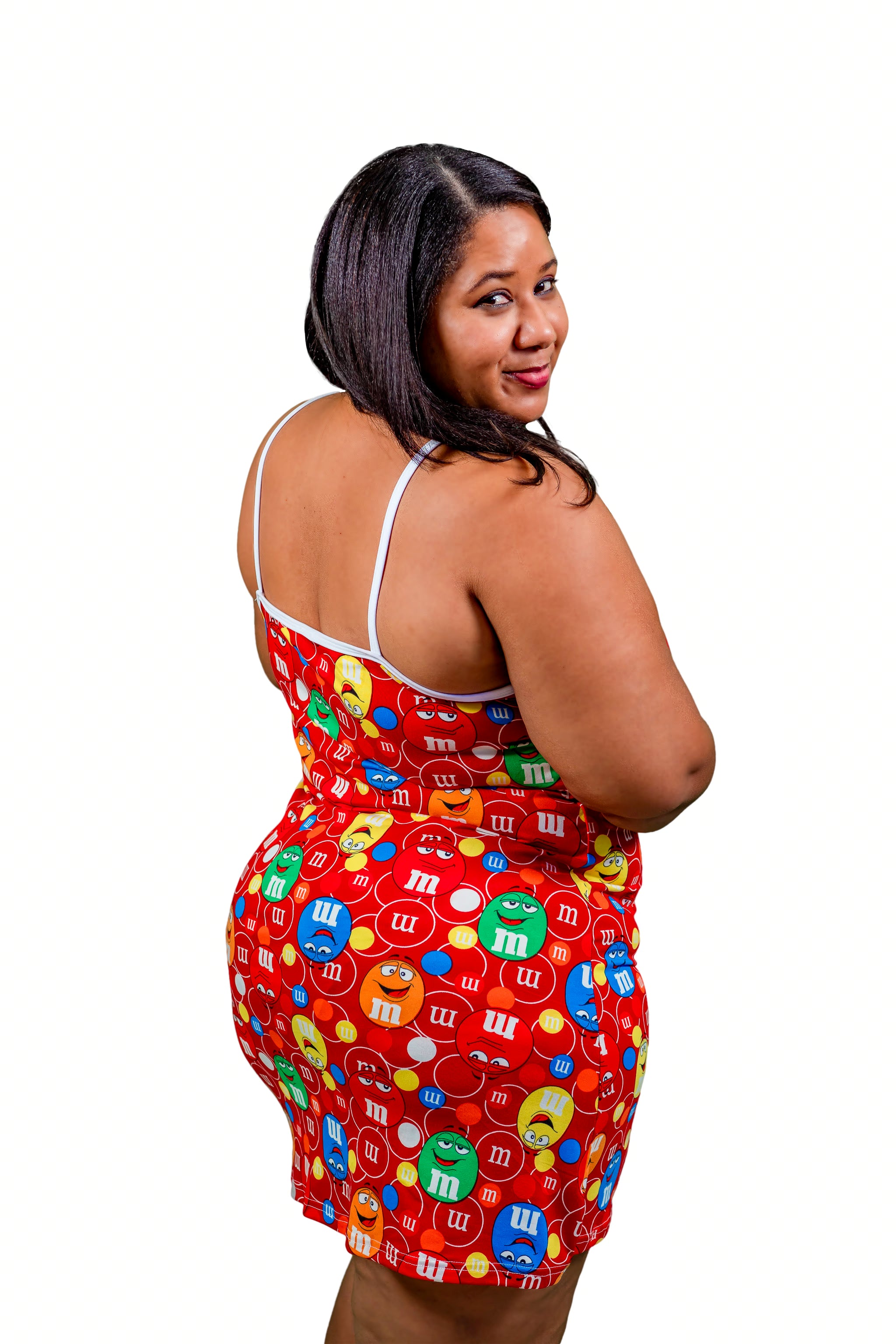Woman wearing the Pop Candy Dreams Signature Cami Sleep Dress featuring colorful candy character print on a white background