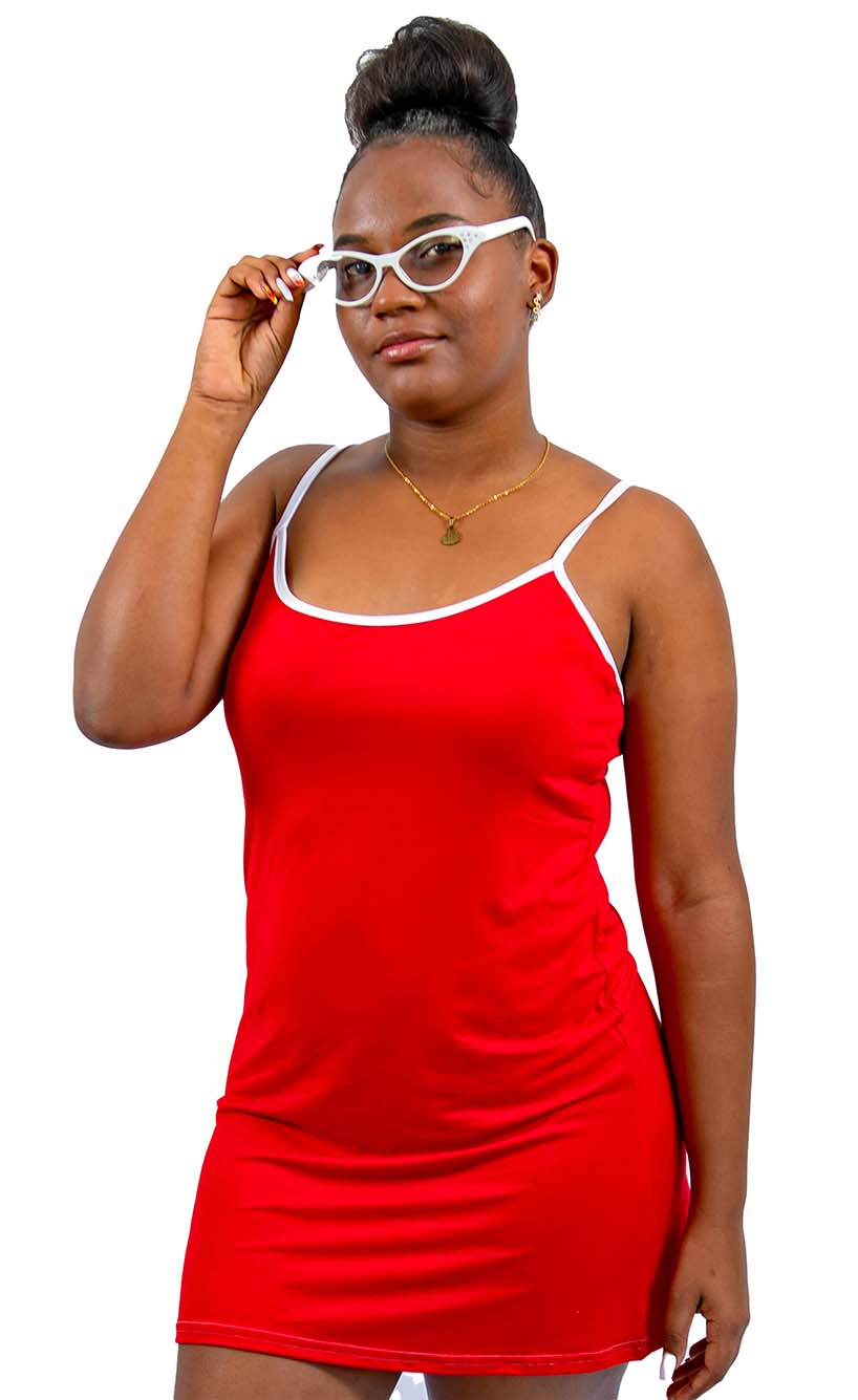Woman wearing a red SLEEP dress and white glasses on a white background