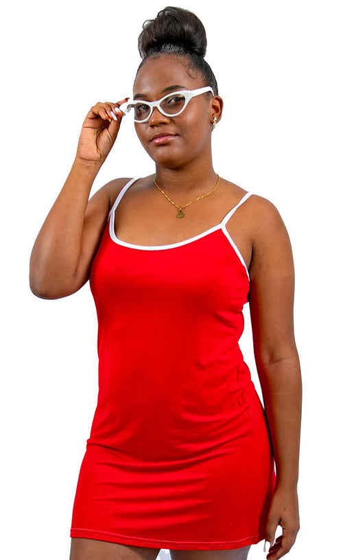 Woman wearing a red SLEEP dress and white glasses on a white background