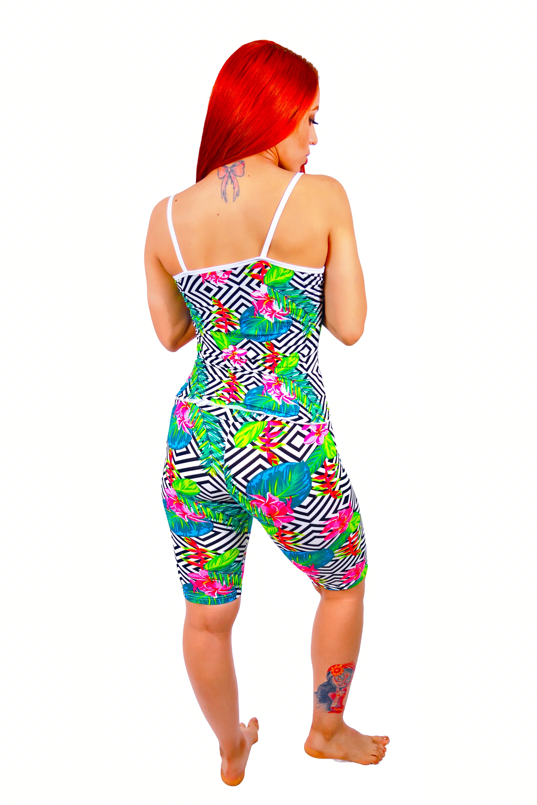 Woman Rear view showing the full-print cami top continuity and sophisticated silhouette of the  Bermuda shorts sleepwear on white background.