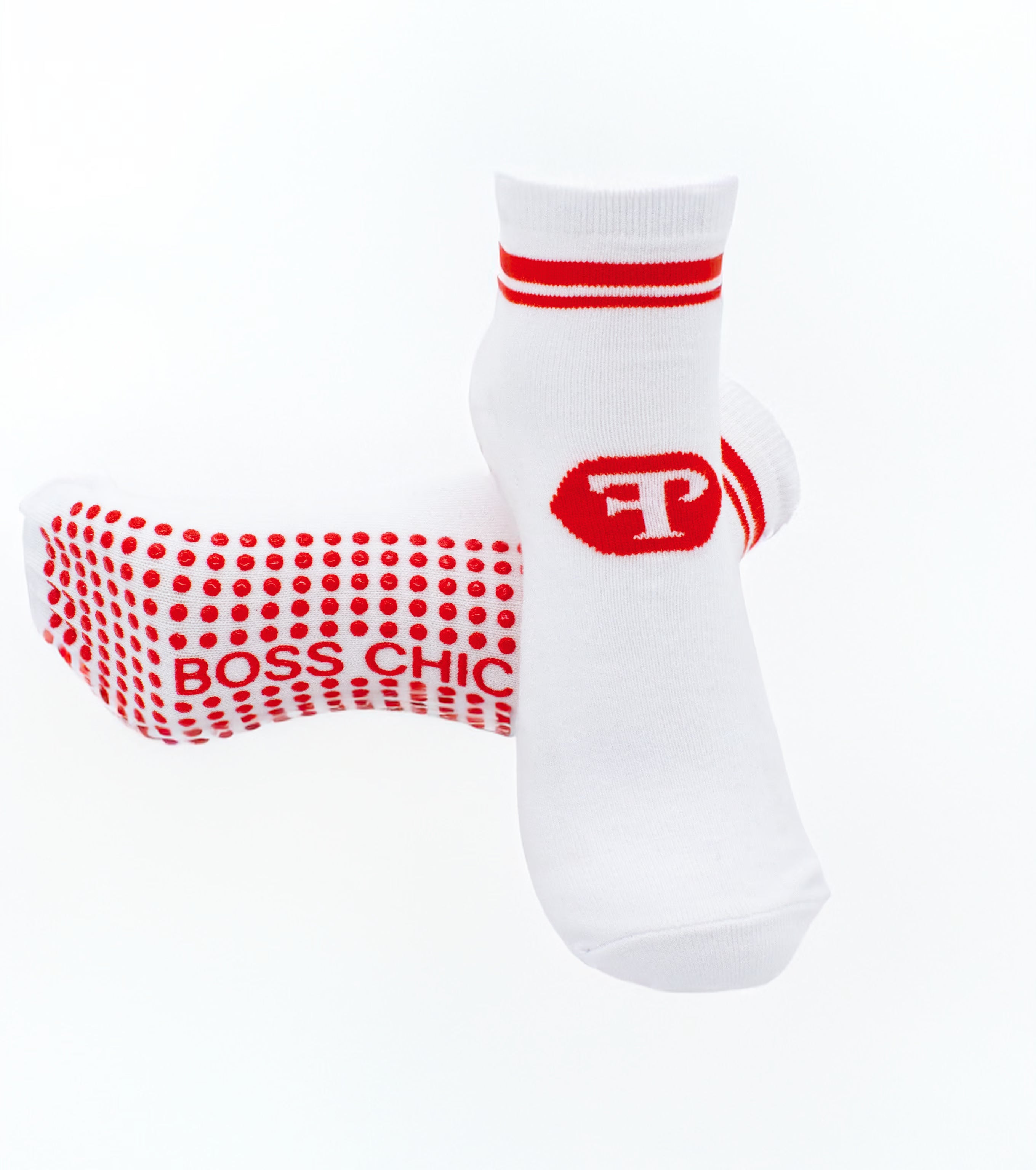 White socks with red grip dots and Boss Chic text on a white background