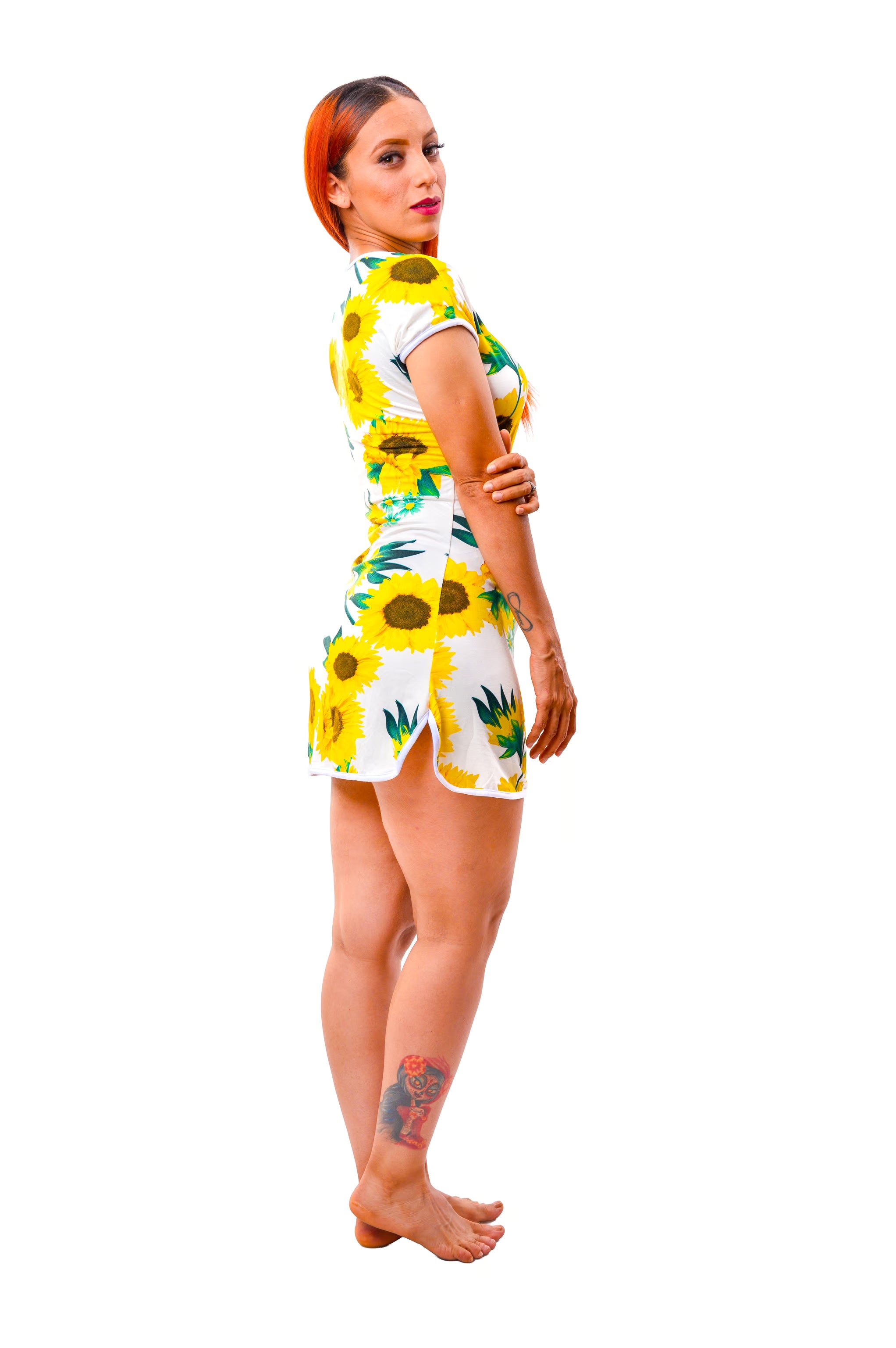 Woman wearing sunflower pattern sleep shirt on white background